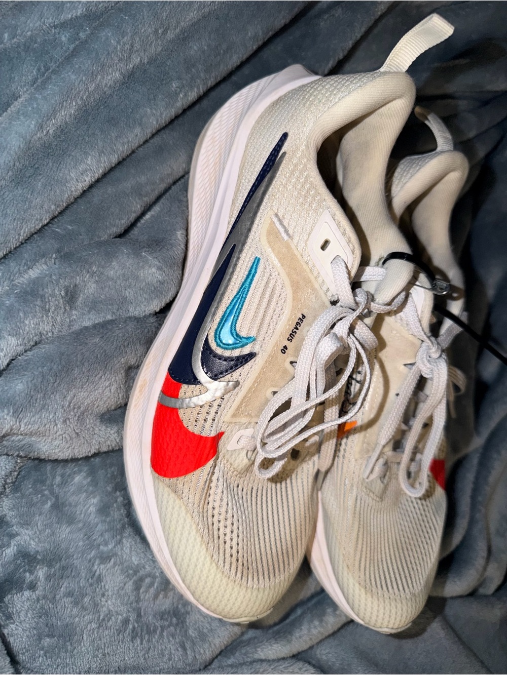 Nike Kids White Sneakers with Red and Blue Swooshes